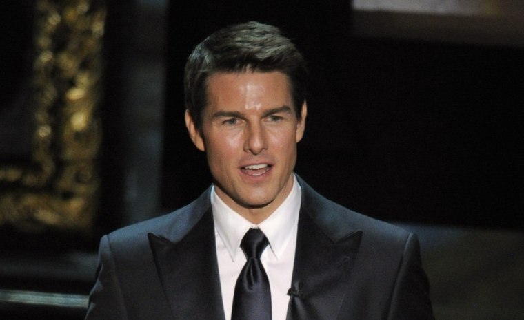 Tom Cruise presents the Oscar for best picture onstage during the 84th Academy Awards on Sunday, Feb. 26, 2012, in the Hollywood section of Los Angeles. (AP Photo/Mark J. Terrill)